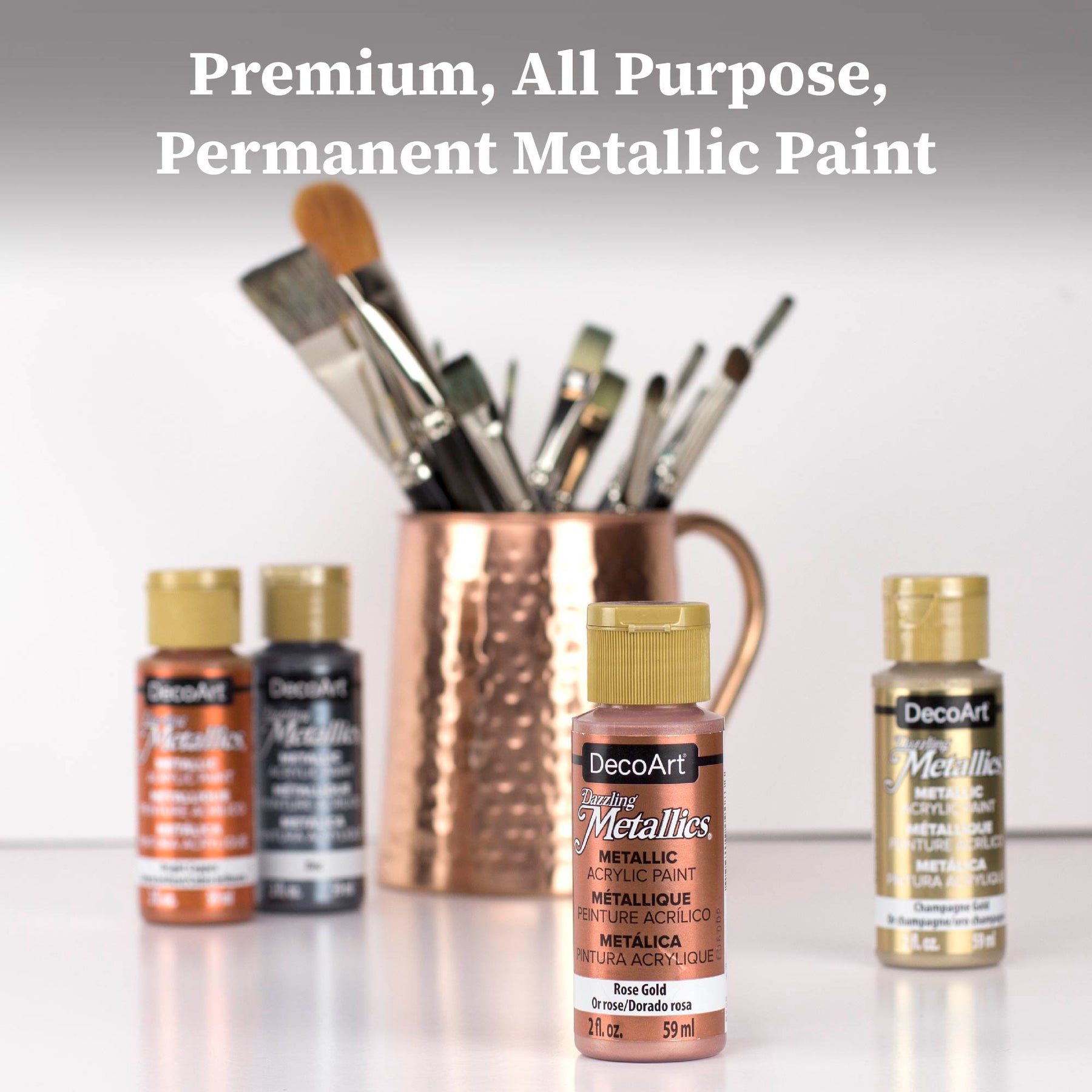 DecoArt Dazzling Metallics acrylic paint set with 9 bold colors in 2 fl oz bottles for arts and crafts projects.