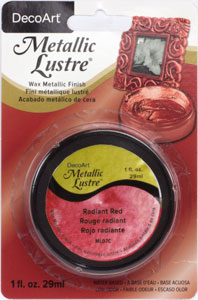 DecoArt Metallic Lustre in Champagne Ice, 1 oz, showcasing the shimmering metallic finish on a smooth surface.