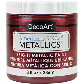 8 oz bottle of DecoArt Americana Decor Metallics pearl finish paint showing the metallic silver color and label on the bottle