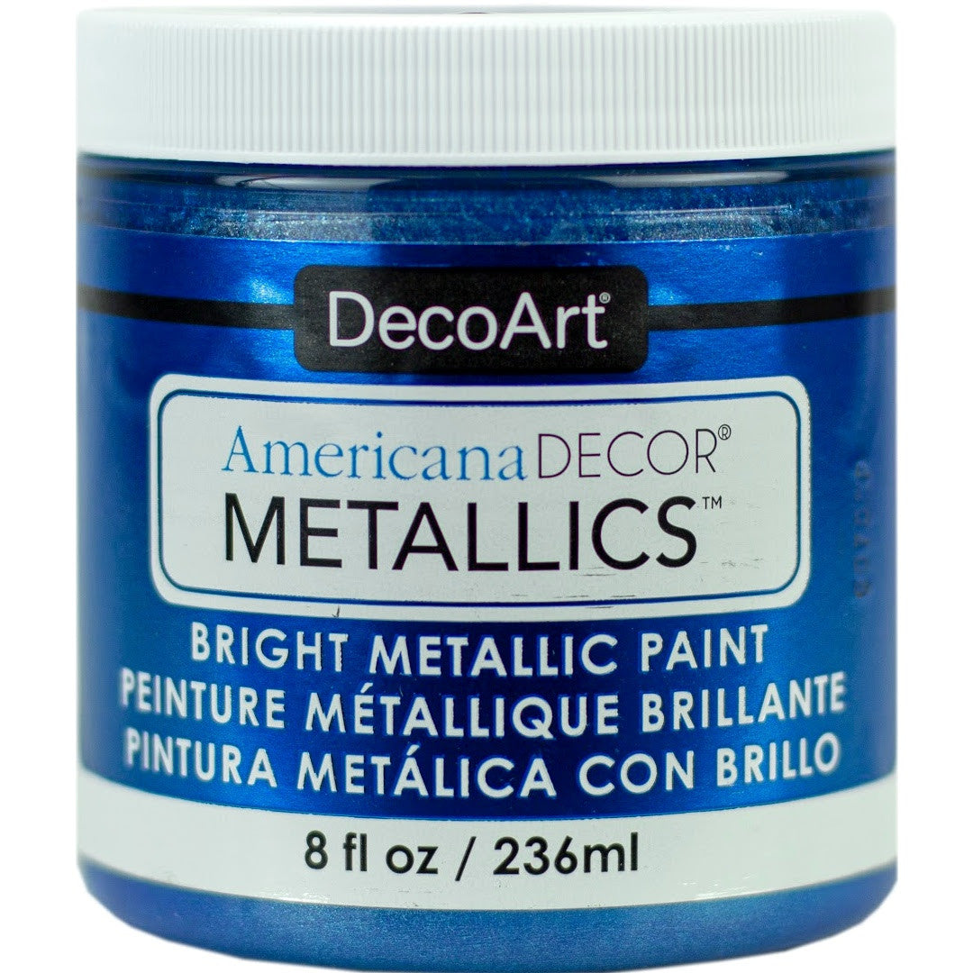 DecoArt Americana Decor Metallics pearl finish in an 8 oz bottle, showcasing a shiny, metallic paint suitable for craft projects.