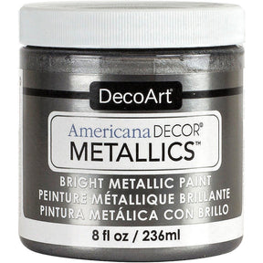 DecoArt Americana Decor Metallics pearl finish paint in an 8 oz bottle, showcasing its smooth, shimmering metallic surface.