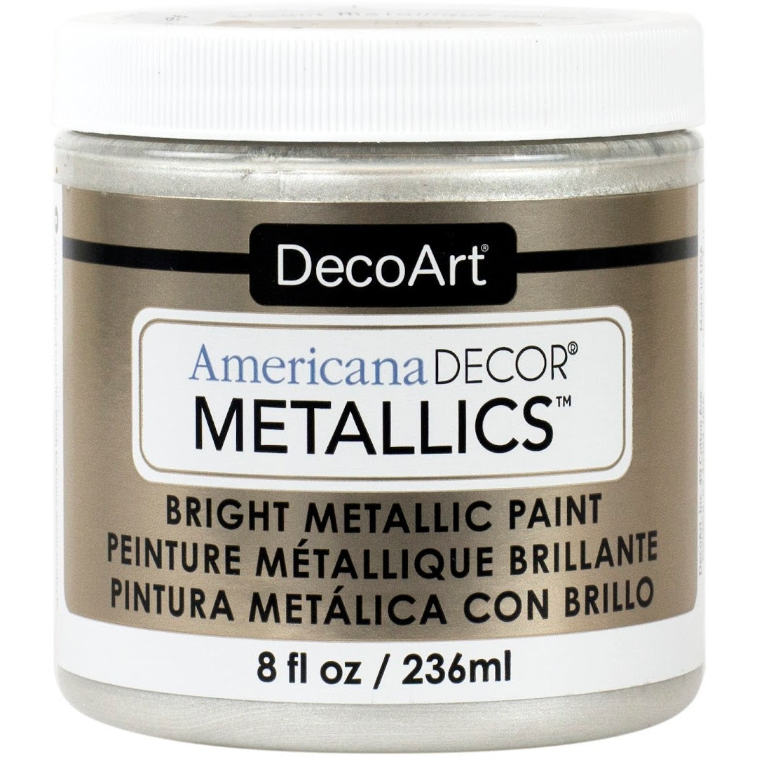 8 oz bottle of DecoArt Americana Decor Metallics Pearl acrylic paint with a shiny metallic finish.