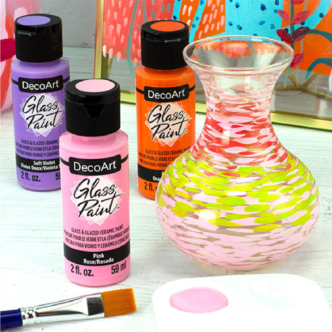 White DecoArt Glass Paint in 2 oz bottle, ideal for decorating and customizing glass surfaces with vibrant color.