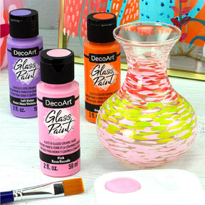 White DecoArt Glass Paint in 2 oz bottle, ideal for decorating and customizing glass surfaces with vibrant color.