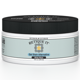 Retique It white wash gel stain applied to wood, showcasing a smooth, light-colored wood finish with a natural wash effect.